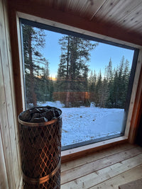 Gather sauna, snowy mountain setting